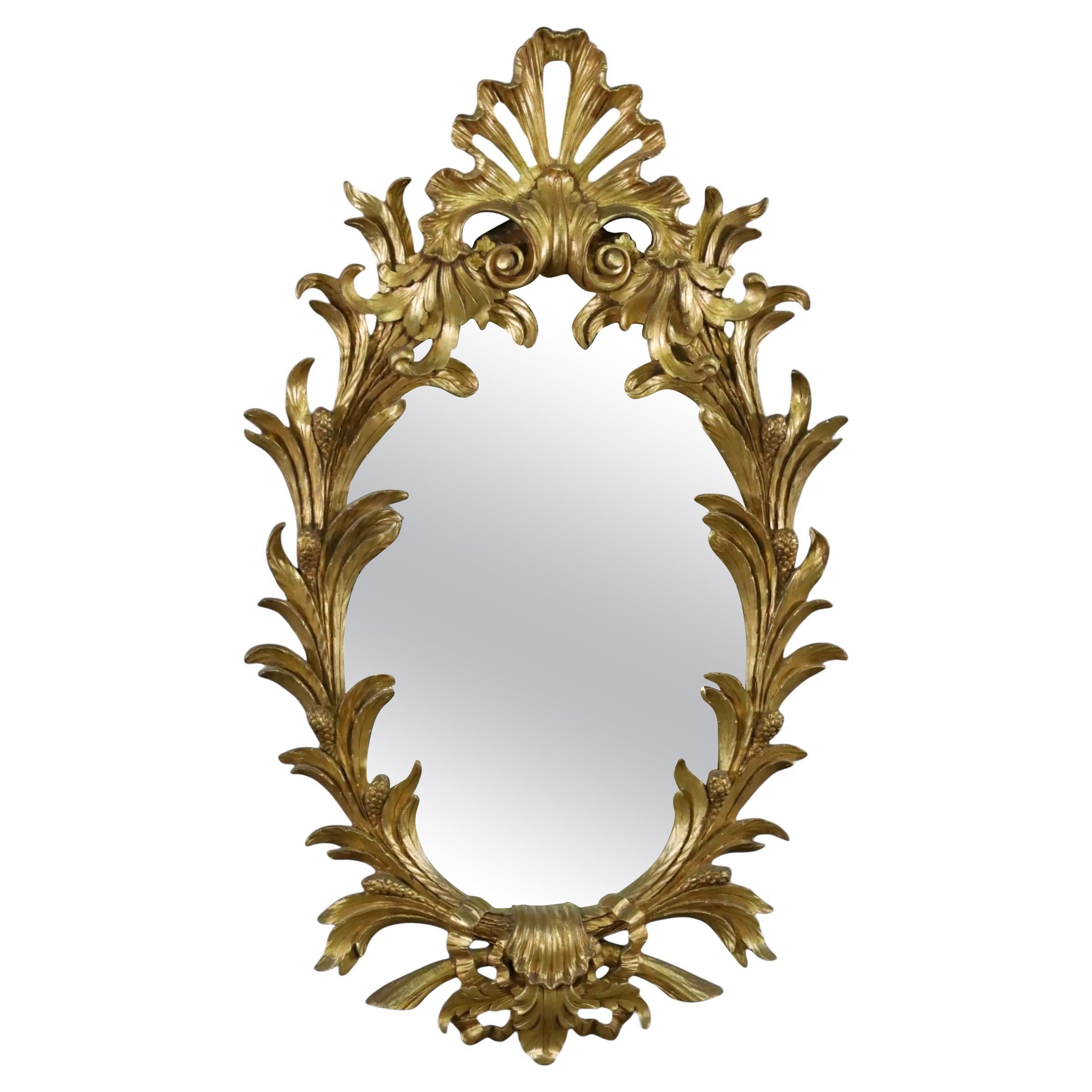 Grande specchio da parete in legno dorato