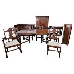 Charles Limbert Jacobean Style Bookmatched Walnut Dining Room Suites, C. 1916