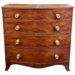 Antique English Flamed Mahogany Bowfront Chest, Circa 1860.