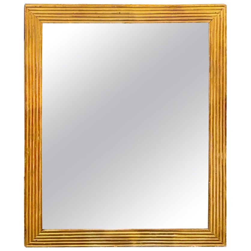 Specchio francese di transizione in legno dorato del XIX secolo