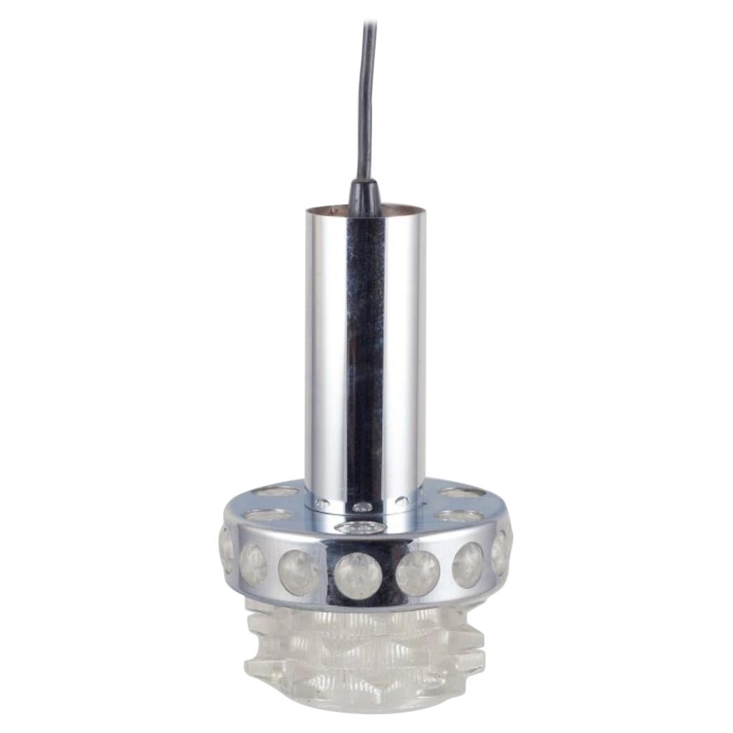 Raak, Holland. Ceiling pendant in chromed metal and clear art glass. 1970s.