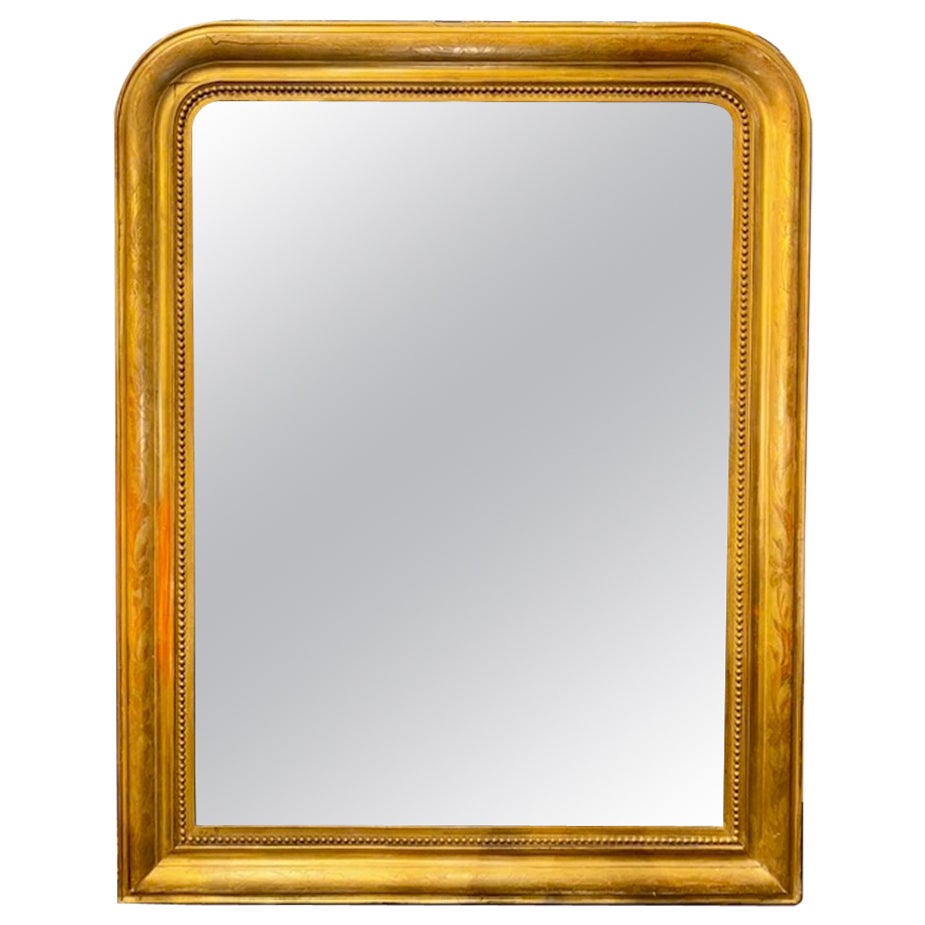 Miroir Louis Philippe du 19ème siècle doré avec motif floral