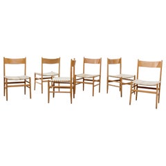 Sillas de comedor danesas inspiradas en Hans Wegner procedentes de una iglesia holandesa