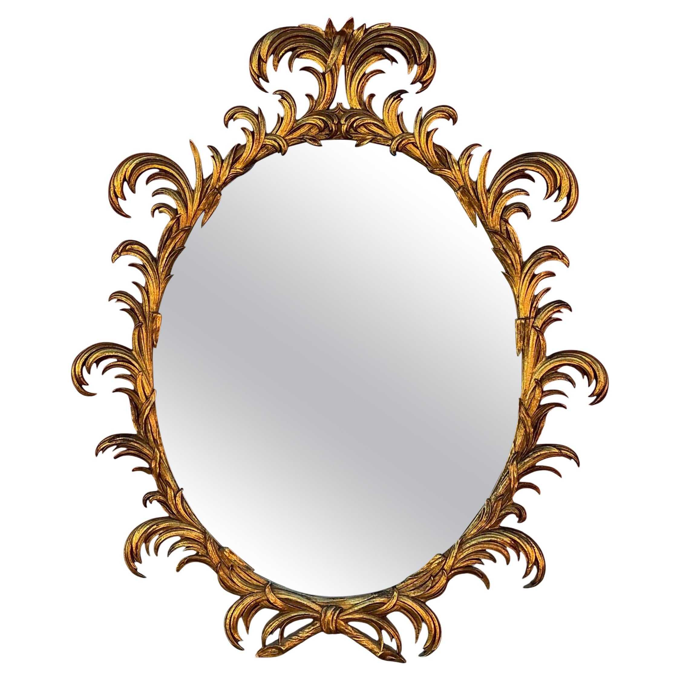 Mid-Century Italian Hollywood Regency Carved Giltwood Oval Mirror