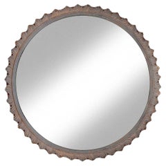 Miroir rond en bois gessé gris accentué d'or