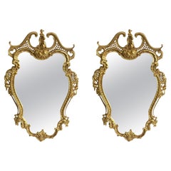 Paire de miroirs en bronze d'ore de style Louis XV du début du 20e siècle