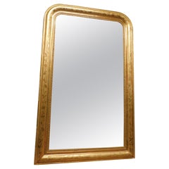 Gilded wooden mirror with rounded corners, Italy