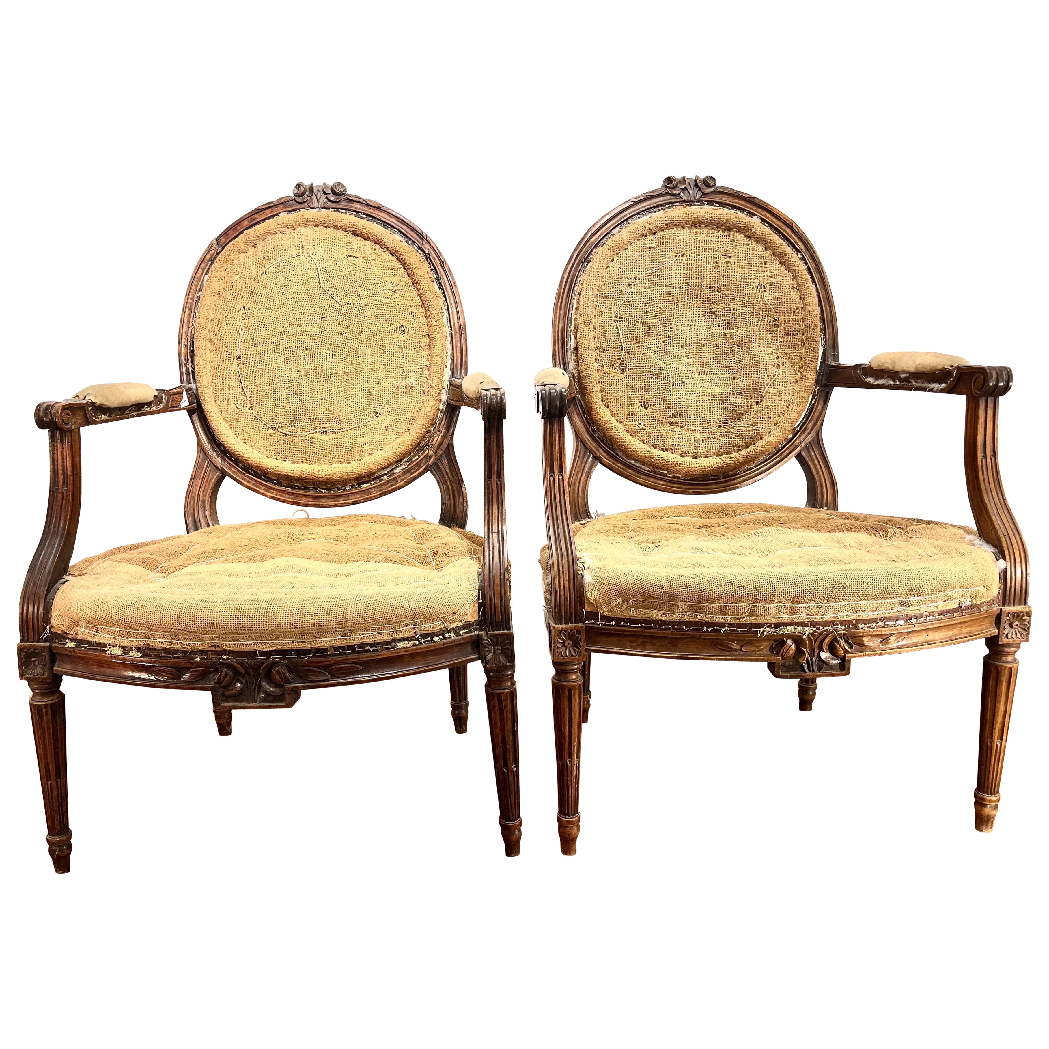 Pair of French Louis XVI Walnut Armchairs or Fauteuils, Hand Carved