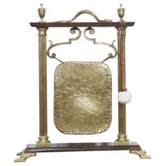 Brass and oak table gong