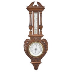 Carved oak wall hanging Banjo barometer