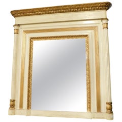 Beige and gilded lacquered wooden mirror with carved side columns, France