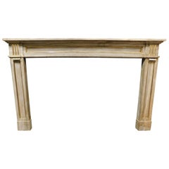 Antique Louis XVI fireplace mantel in grey marble with gold trim, Italy