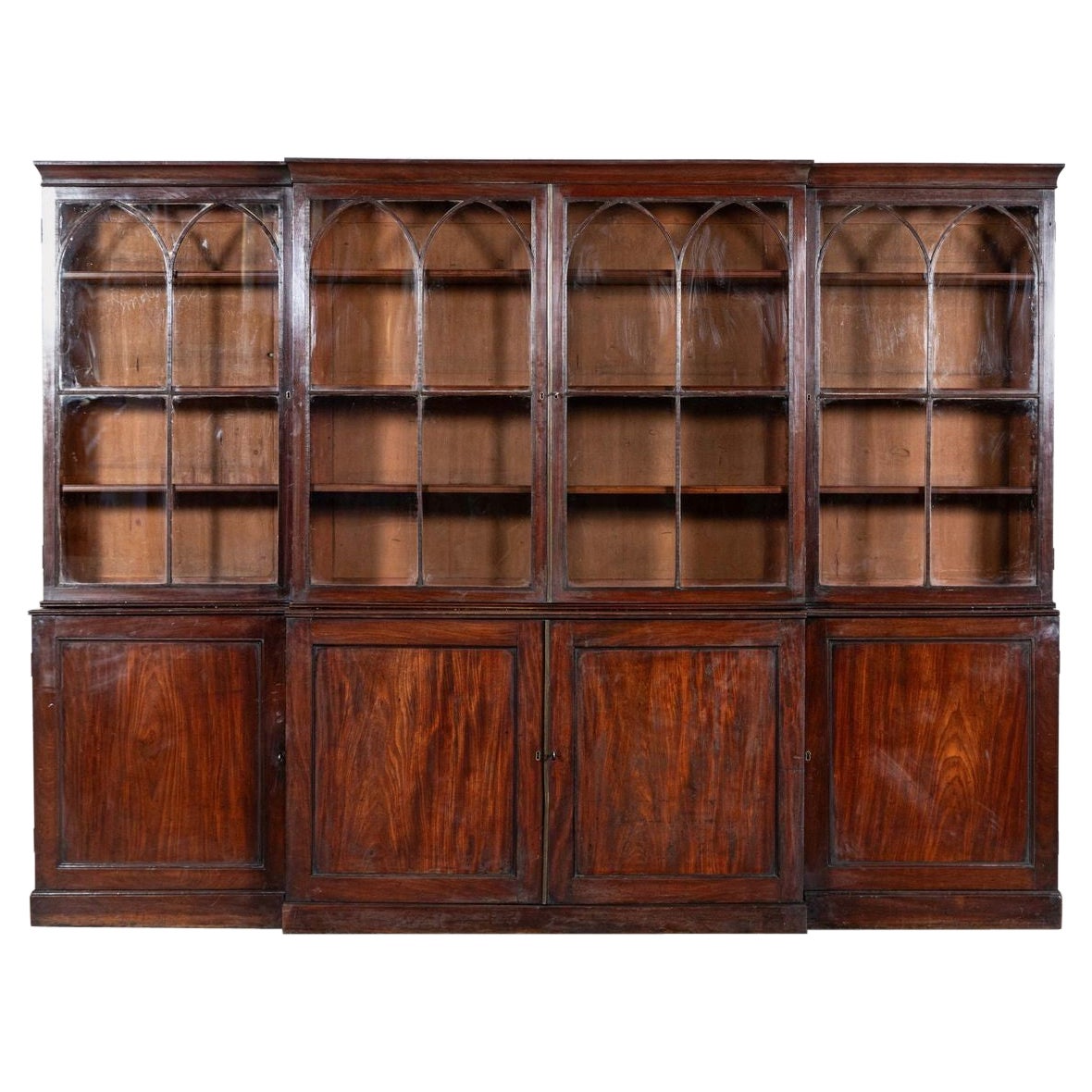 Monumental English Early 19thC Astral Arch Glazed Mahogany Breakfront Bookcase