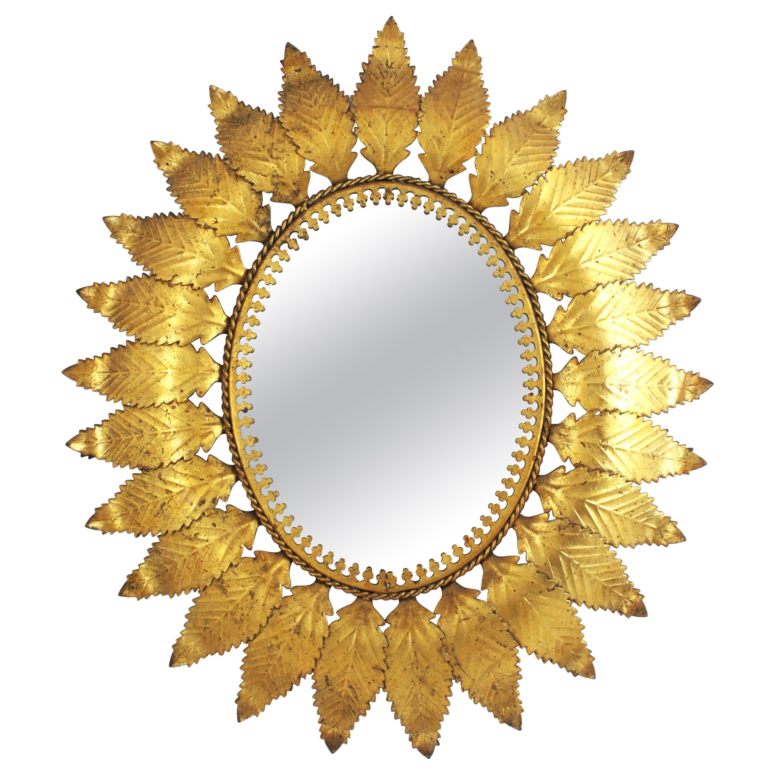 Espejo oval de hierro dorado con marco de hojas, España Años 50