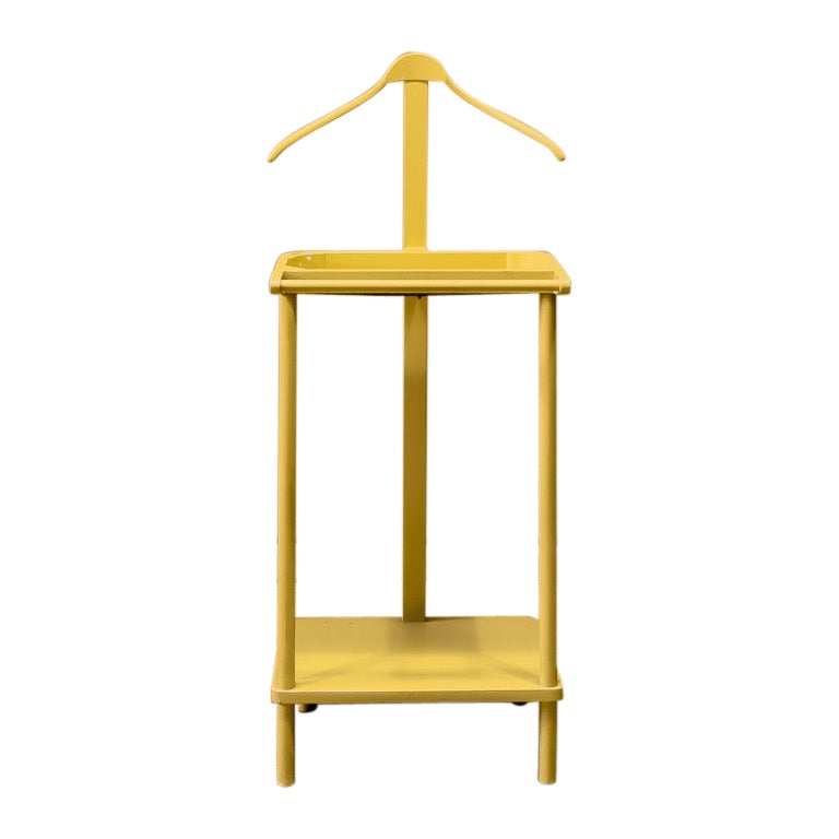 What is the purpose of a valet stand?
