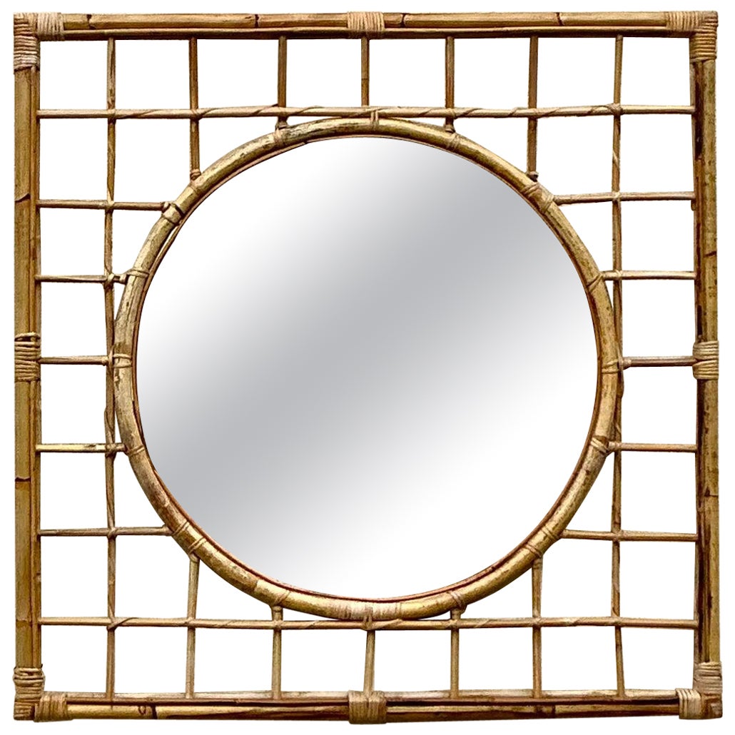 Vieux miroir côtier en rotin