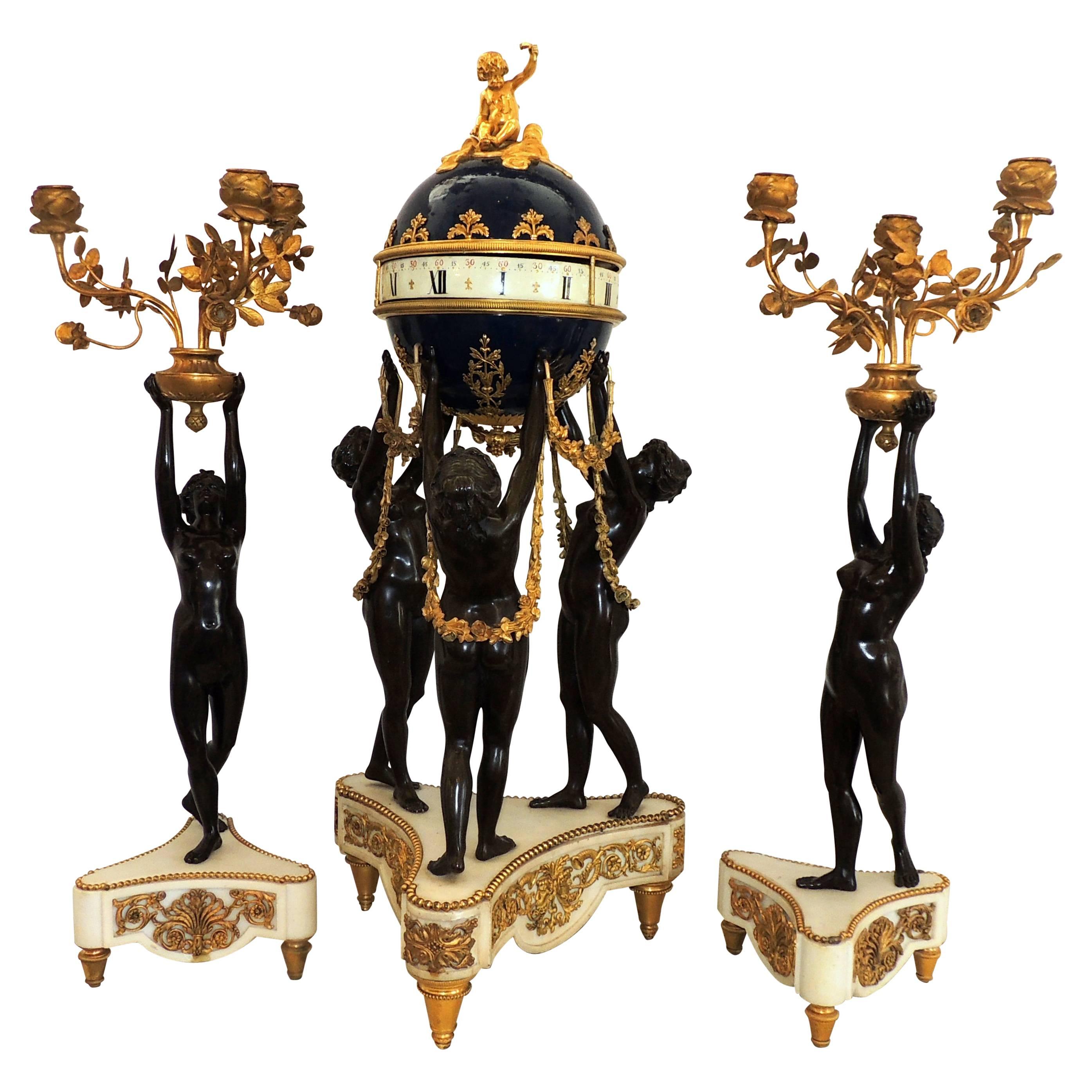 Exceptional French Three-Piece Rotary Mystery Clock Set Maiden Candelabra Suite