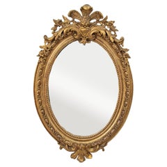 Nineteenth Century French Regency Style Oval Gilt Wood Mirror 27-in H X 18-in W