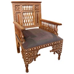 1990s Arabic Armchair Carved in Teak Wood with Geometric Inlays