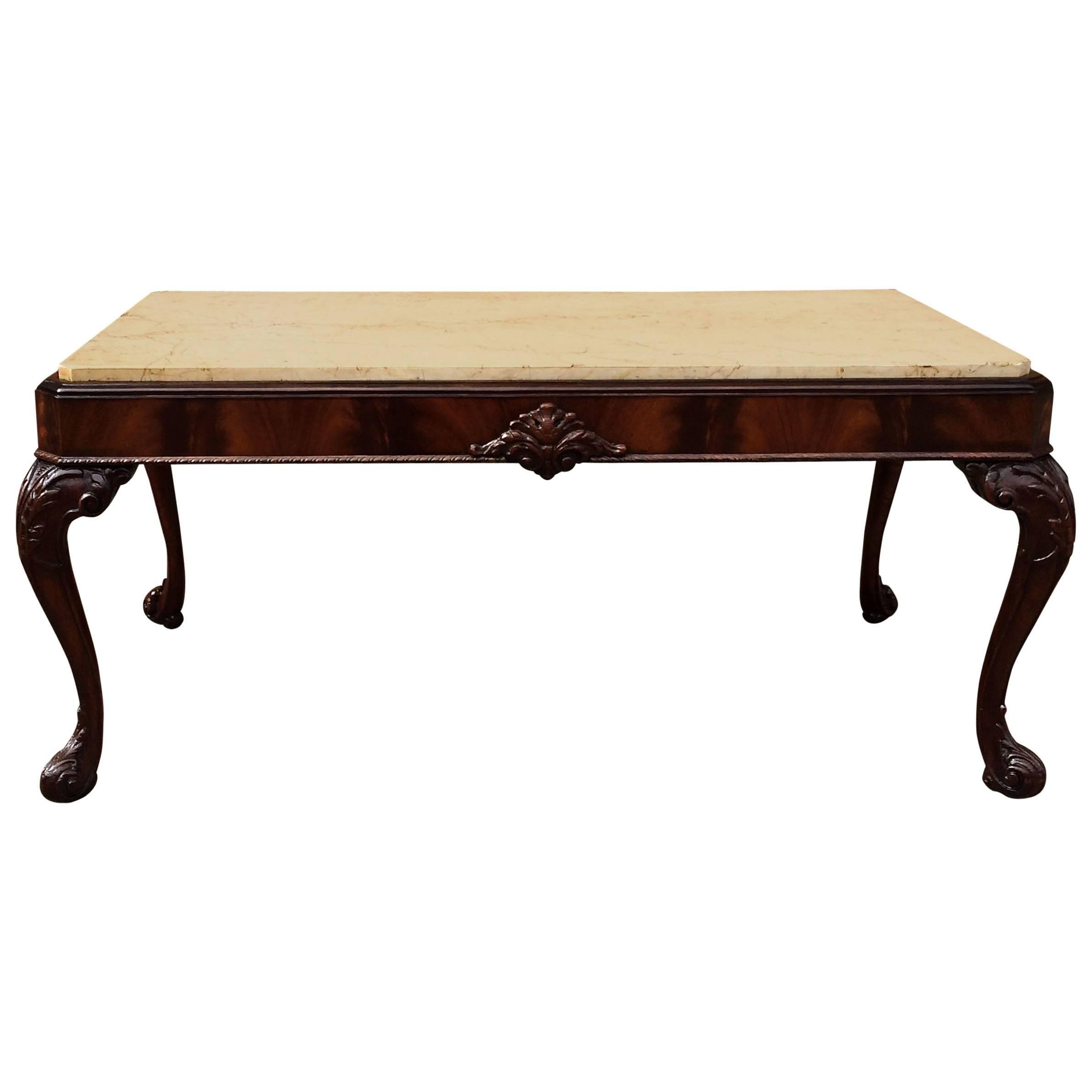 Antique Carved Flame Mahogany And Marble Coffee Table