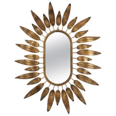 Sunburst Oval Mirror in Gilt Metal with Foliage Frame