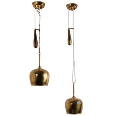 Paavo Tynell, Pair of Adjustable Counter Balance Pendant Lights, Model A1957