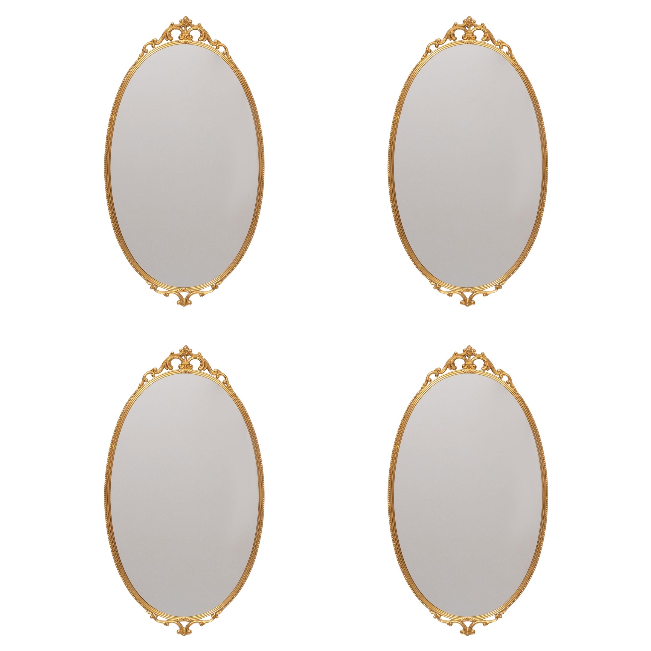 Lote de 4 Espejos de pared clásicos de latón en forma de medallón  1970s