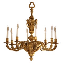 Lustre à huit lumières en bronze doré de style Regence