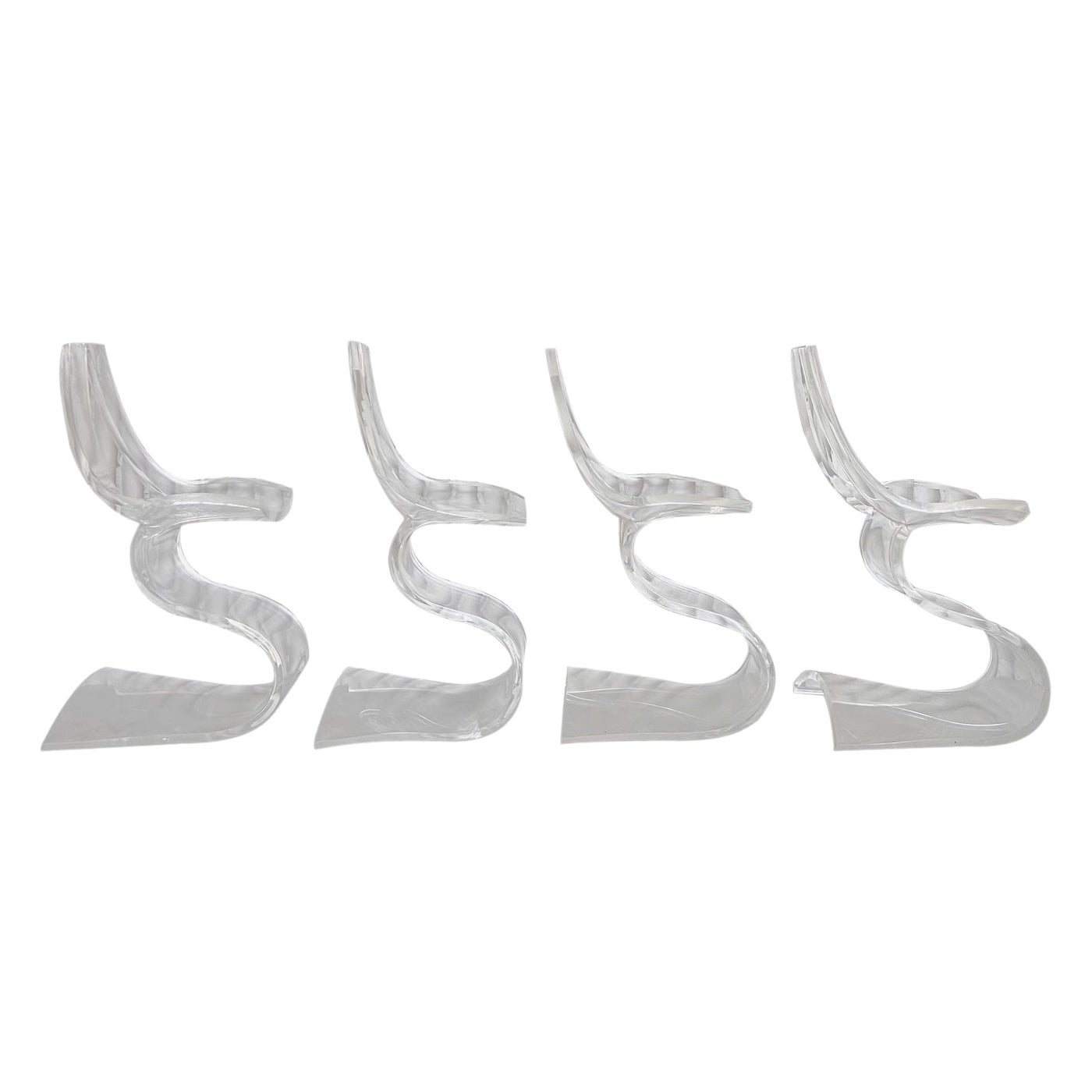 Rare set of 4 sculptural Lucite chairs by Michel Dumas For Sale