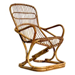 Vintage Coastal Tito Agnoli Bent Rattan Lounge Chair