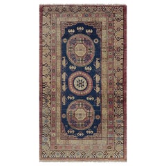 Antiker Khotan-Teppich in Blau, Braun-Braun und Gold mit Medaillons - Rug & Kilim