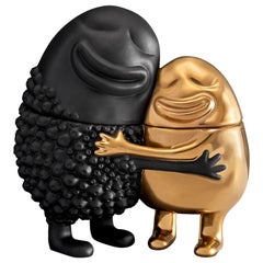 Abrazo Caja Negra y Dorada