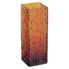 Scandinavian glass artist. Large art glass vase in amber-colored glass.
