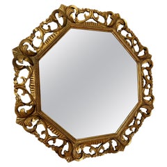 French 1950s antique mirrors of octagonal shape with gilt wood frame