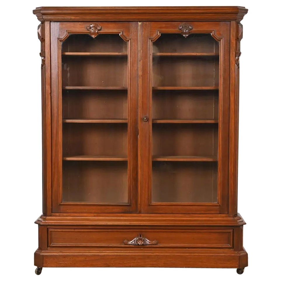 Herter Brothers Style Antique Victorian Carved Walnut Glass Front Bookcase