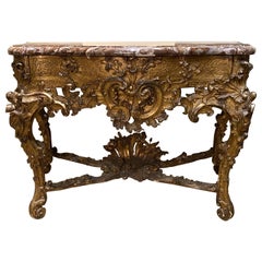 Eccezionale commode rococò del XVIII secolo in legno dorato con piano in marmo