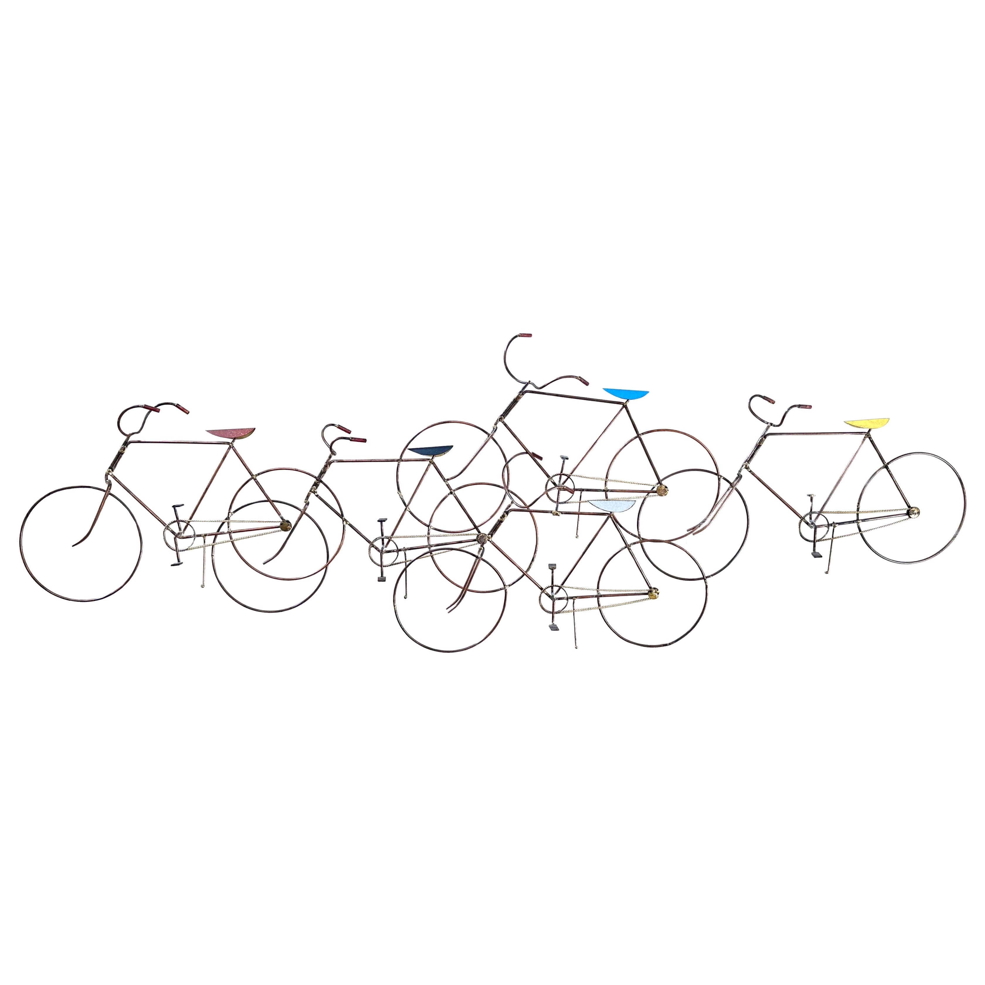 C. Escultura mural en bicicleta Jere