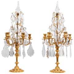 Paire de candélabres de style Louis XVI en bronze doré et cristal