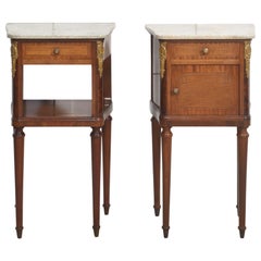 Pair of gilt metal mounted bedside cabinets