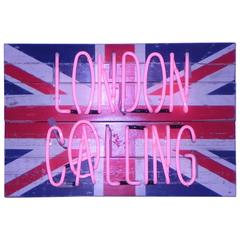 London Calling in Pink Neon back onto Union Jack by Illuminati Neon