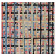Rug & Kilim's Distressed Square Rug in Polychromatic Geometric Patterns (Tapis carré vieilli à motifs géométriques polychromes)