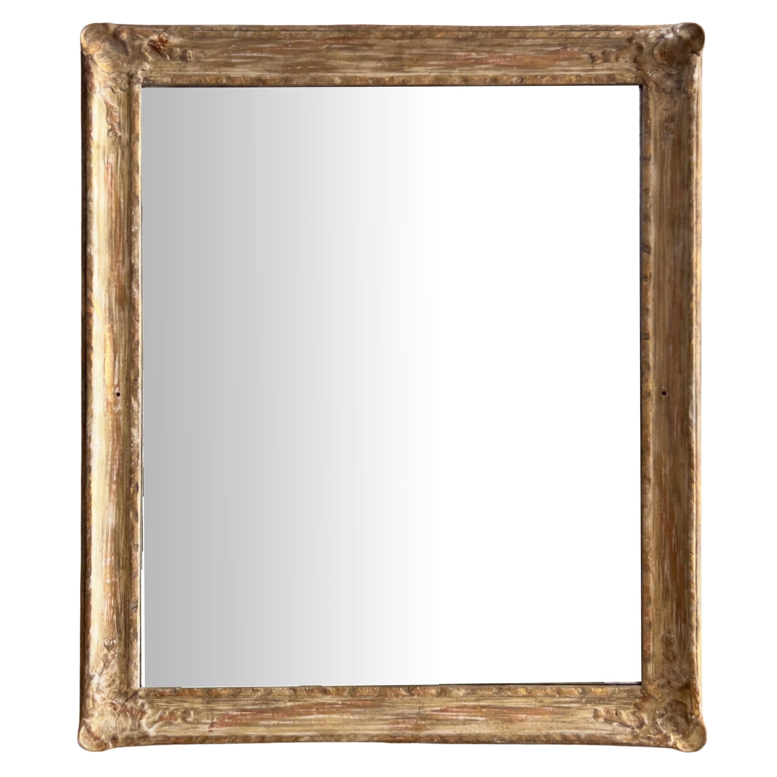 Vieux miroir doré Newcomb-Macklin avec cadre sculpté, début du 20ème siècle en vente