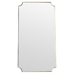 A large orignal 1950s Italian brass framed landscape or portrait mirror