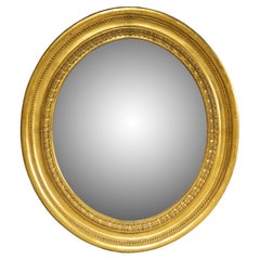 Grand miroir mural ovale en bois doré du XIXe siècle, C.I.C.