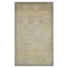 Alfombra escandinava de Rug & Kilim con motivos geométricos beige-marrón y dorados