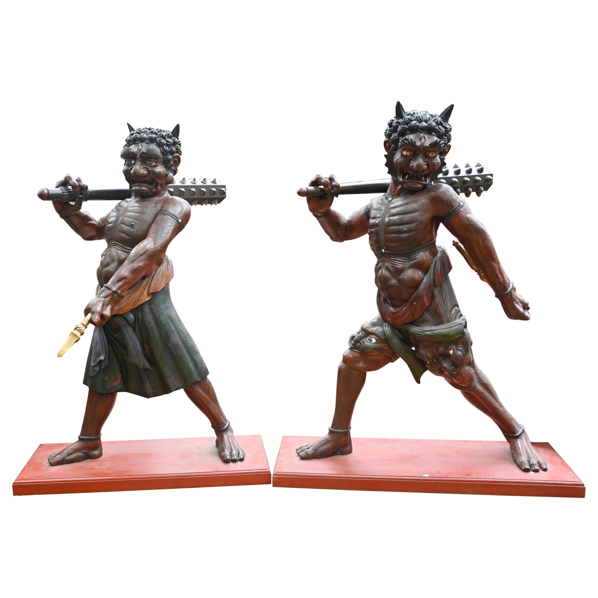 Paire de sculptures japonaises Meiji Oni représentant des démons en vente