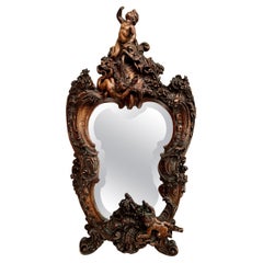 Antique 19th Century French Highly Carved Walnut Framed Beveled Mirror, Ca. 1875