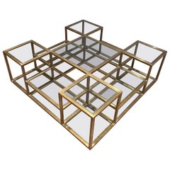 Large Multi-Tiered Brass Coffee Table. French work. Circa 1970