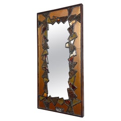 A copper and glass mirror