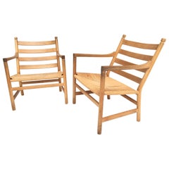 Pair of CH44 Hans Wegner lounge chairs Carl Hansen & Son Denmark